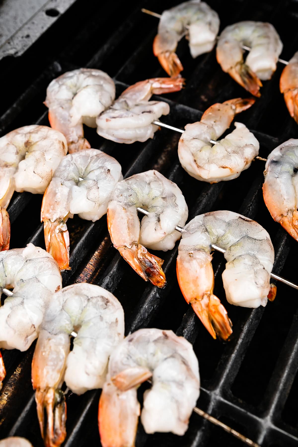 Place on skewers and preheat the grill.