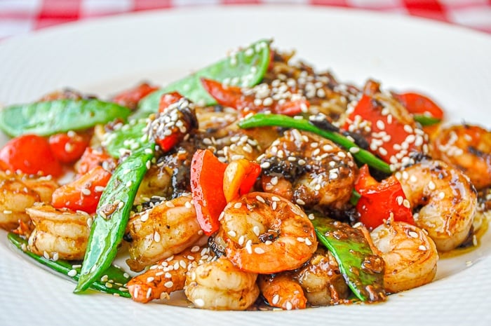 Easy Black Bean Ginger Spicy Shrimp wide shot photo on white platter