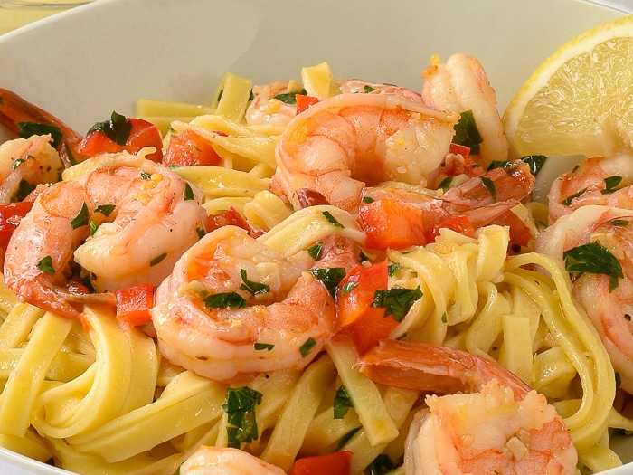Super simple shrimp scampi close up photo of single serving in a white bowl