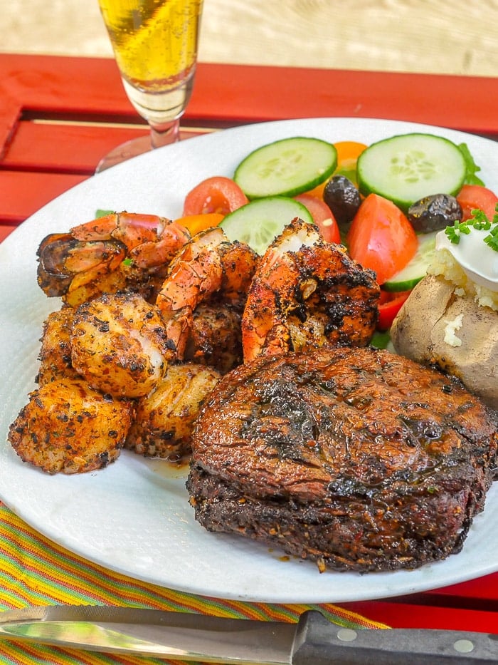 Cajun Spice Rub on Surf and Turf on a white plate vertical shot.