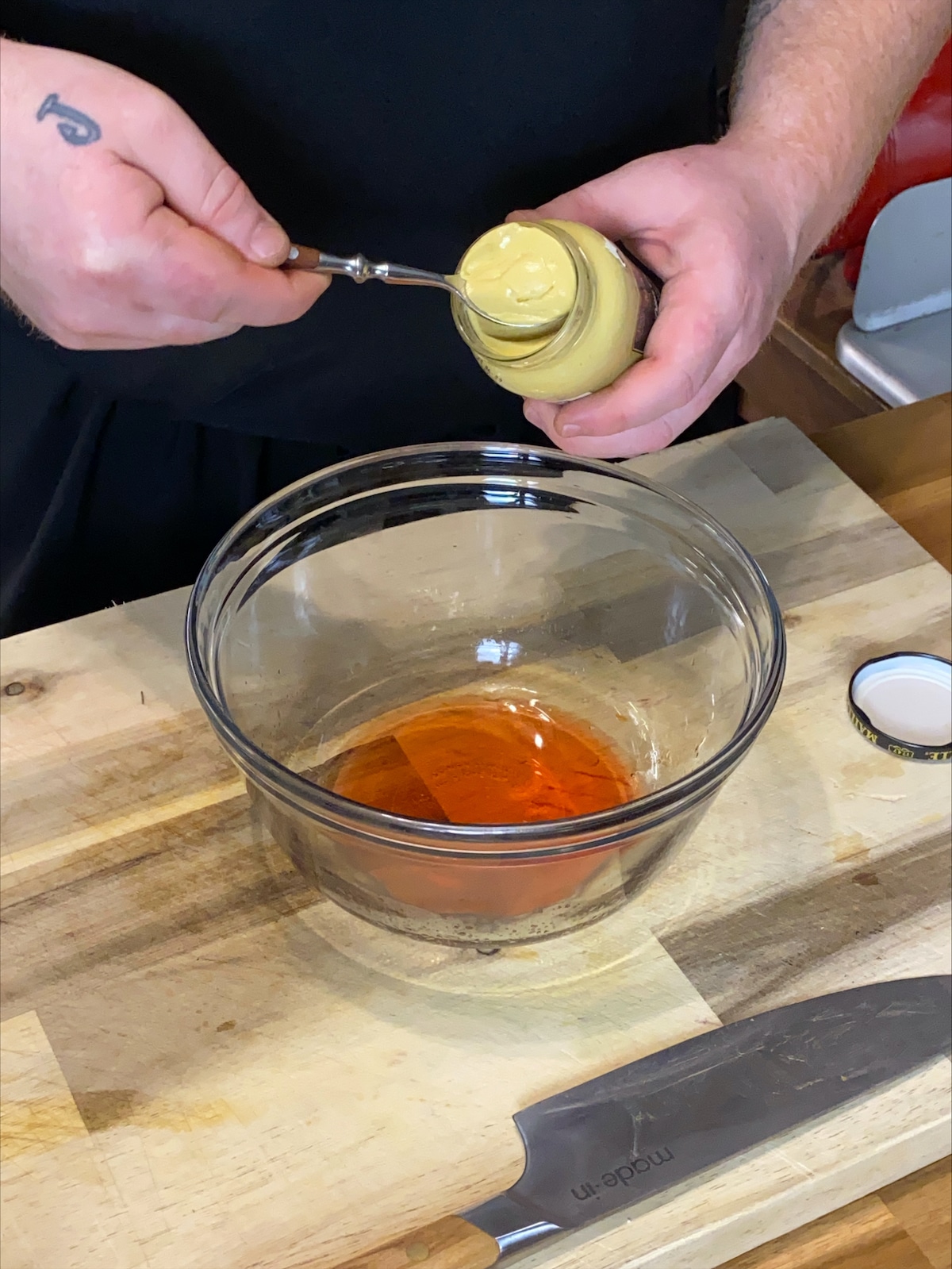 Adding the dijon mustard.