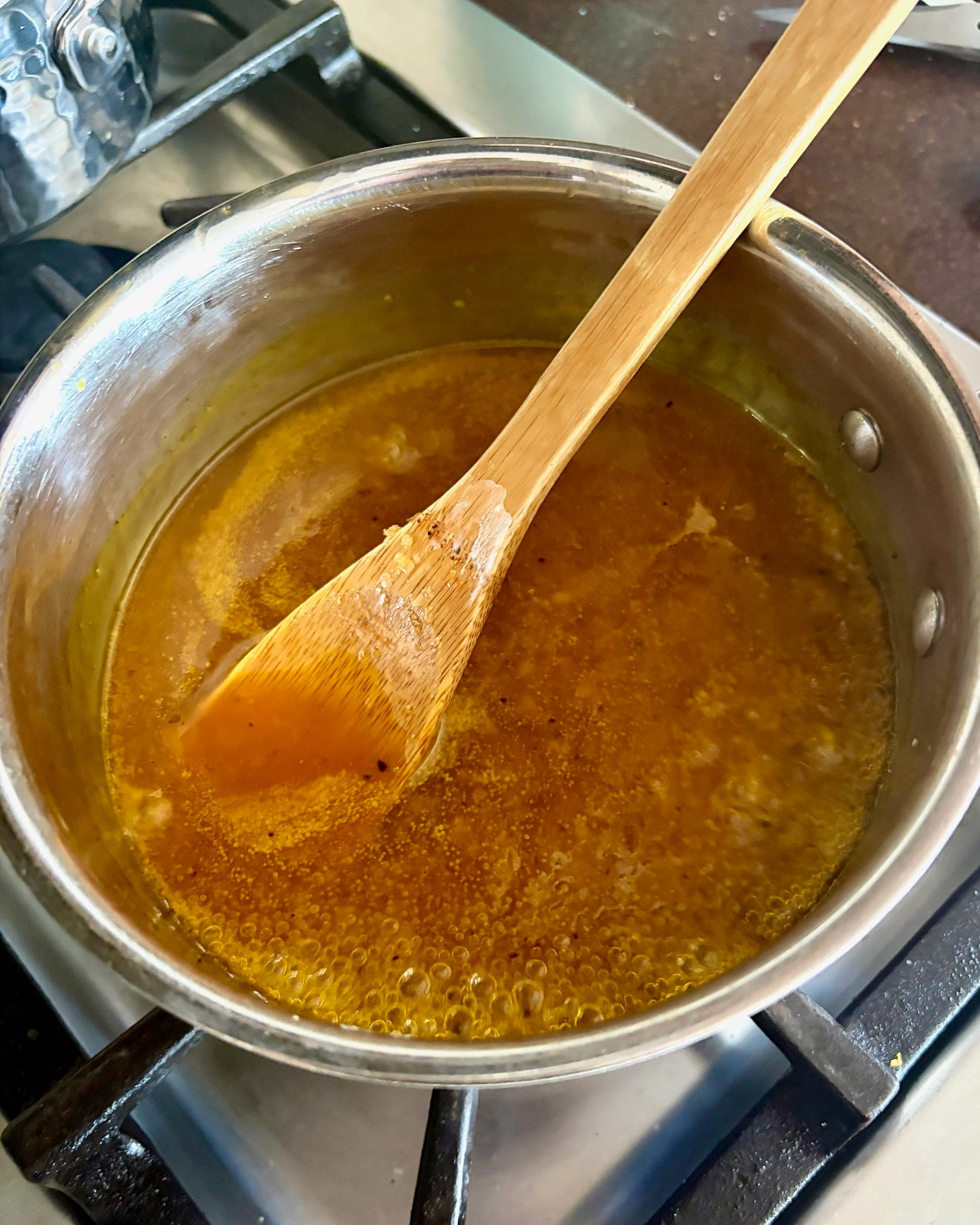 The lemon sauce simmering in the stove.