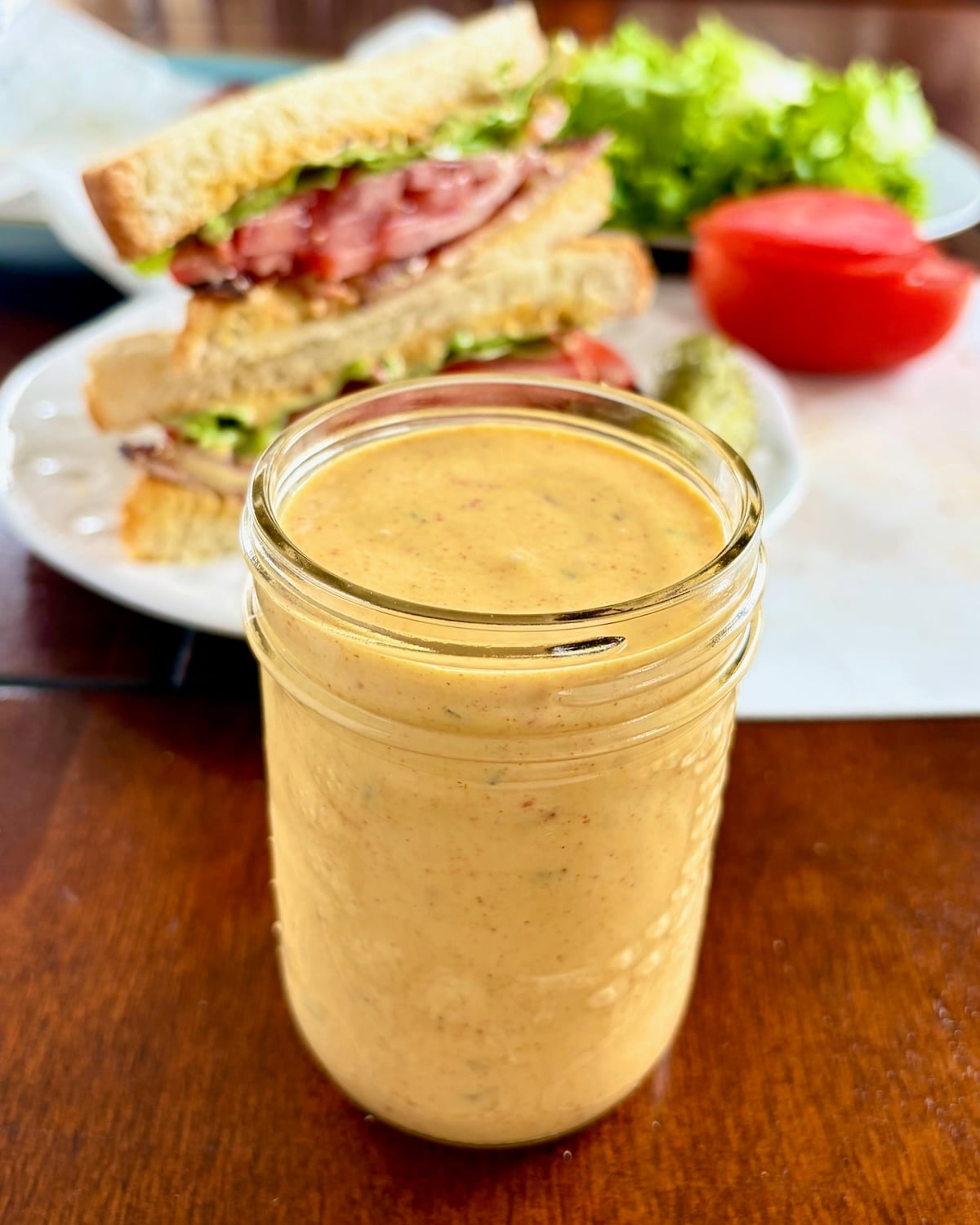 Photo of one jar of homemade copycat sandwich bread