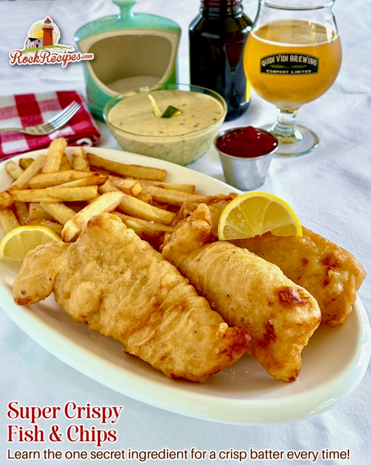 Super Crispy Fish and Chips photo of e pices of fish and chips in a white plate with title text added for Pinterest and social media posts.