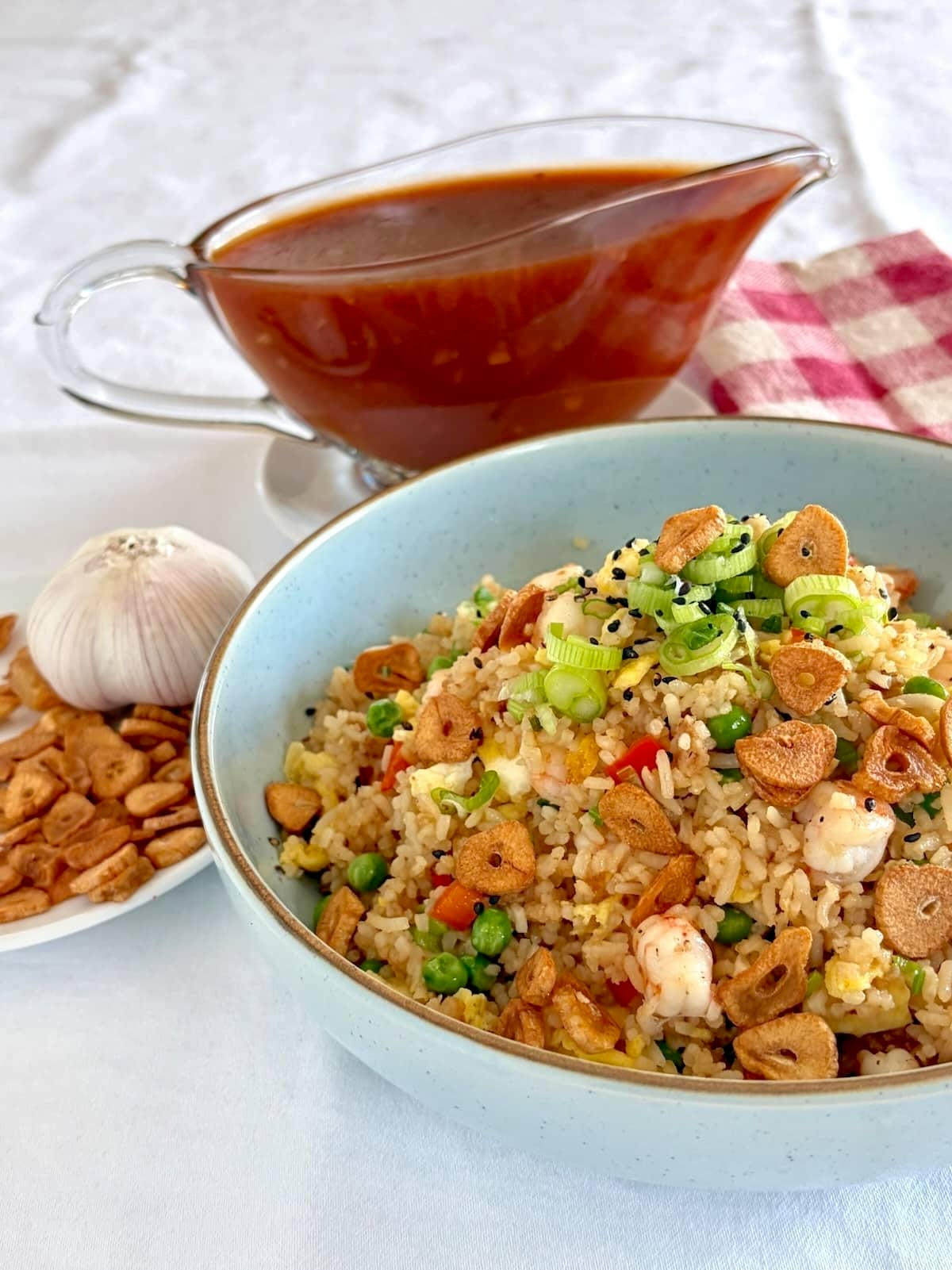 Photo of Shrimp Fried Rice, garnished with crispy garlic.